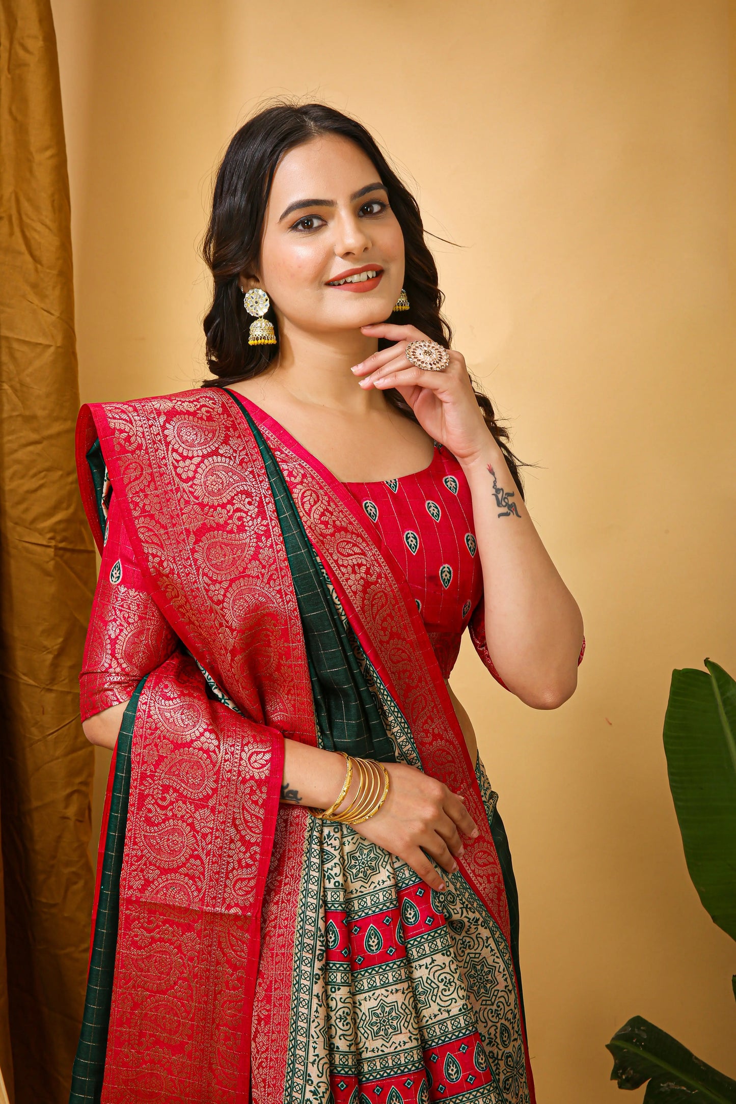 MoonPalav Elegant Green Dola Silk Saree with Red Accents Moonpalav