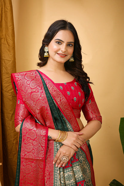 MoonPalav Elegant Green Dola Silk Saree with Red Accents Moonpalav